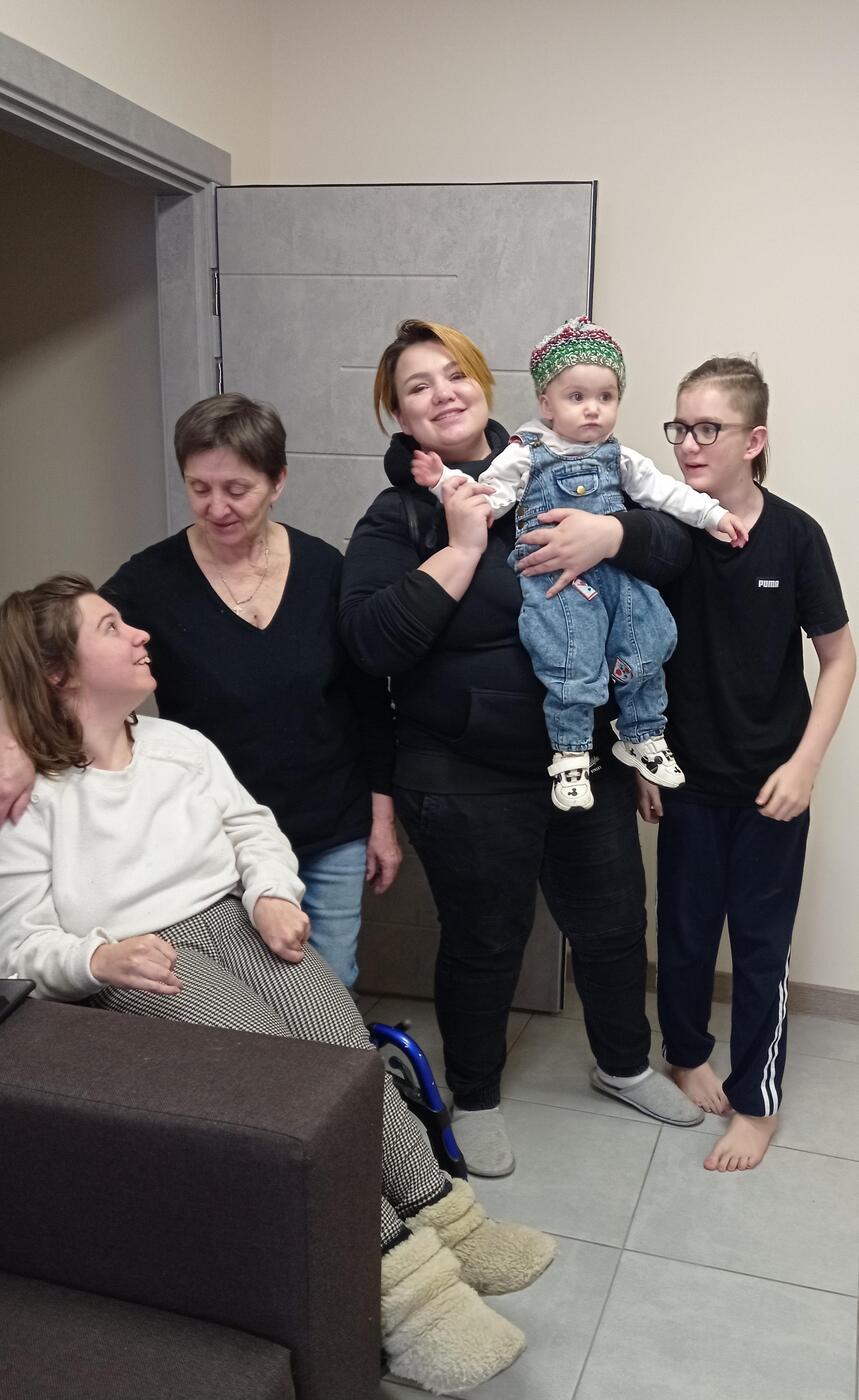 A family poses for a group photo.