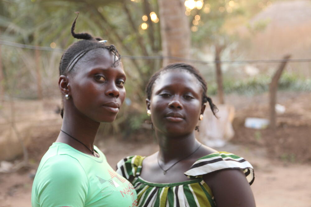 Two girls looking at camera