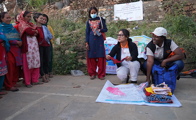 UNFPA members present items from a dignity kit,