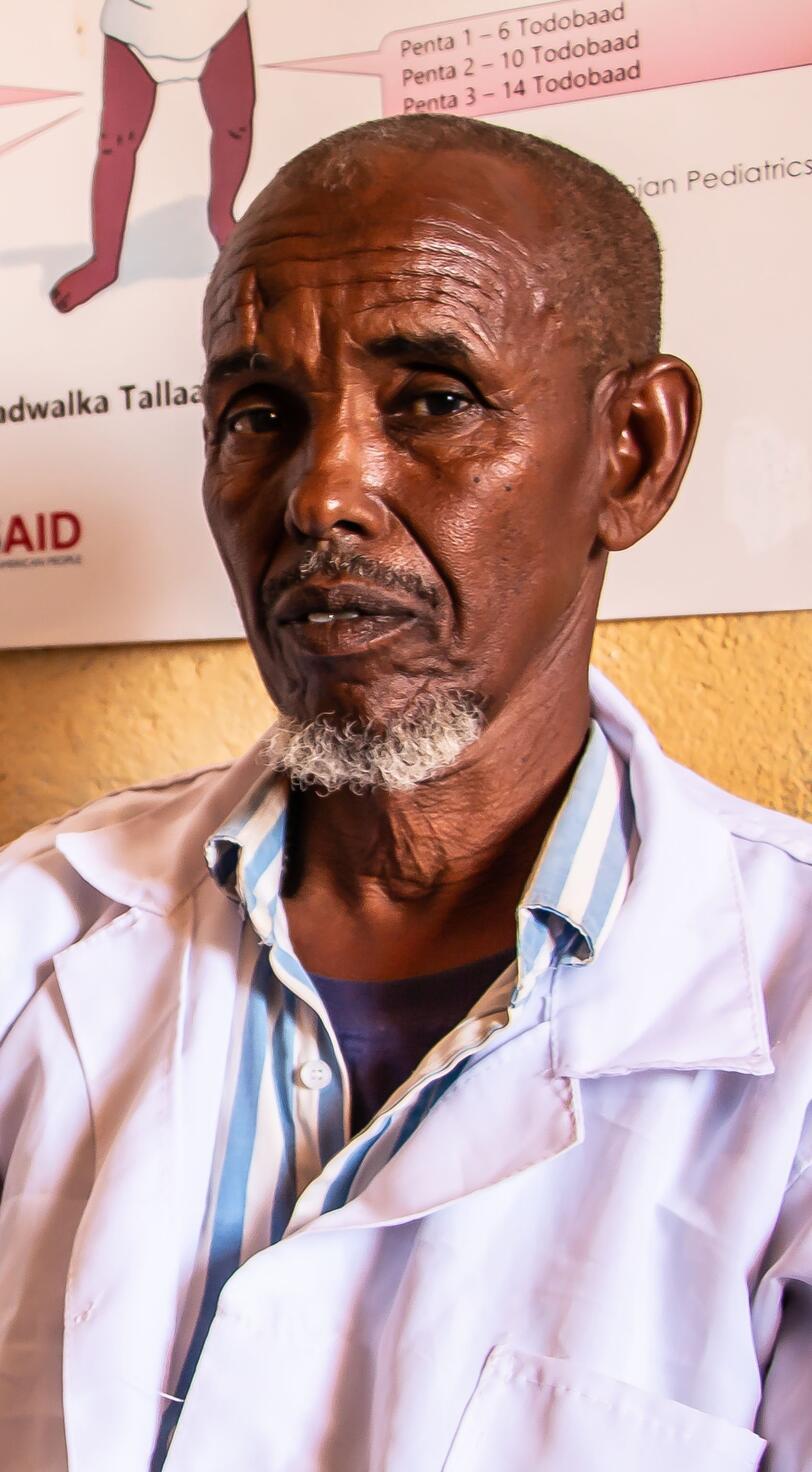 A man sits in a health centre.