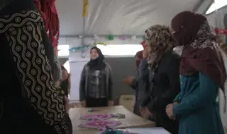 Women's centre in Iraq helps women "knit" their…